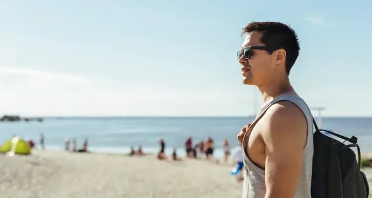 young-man-on-beach-2024-10-11-10-52-09-utc